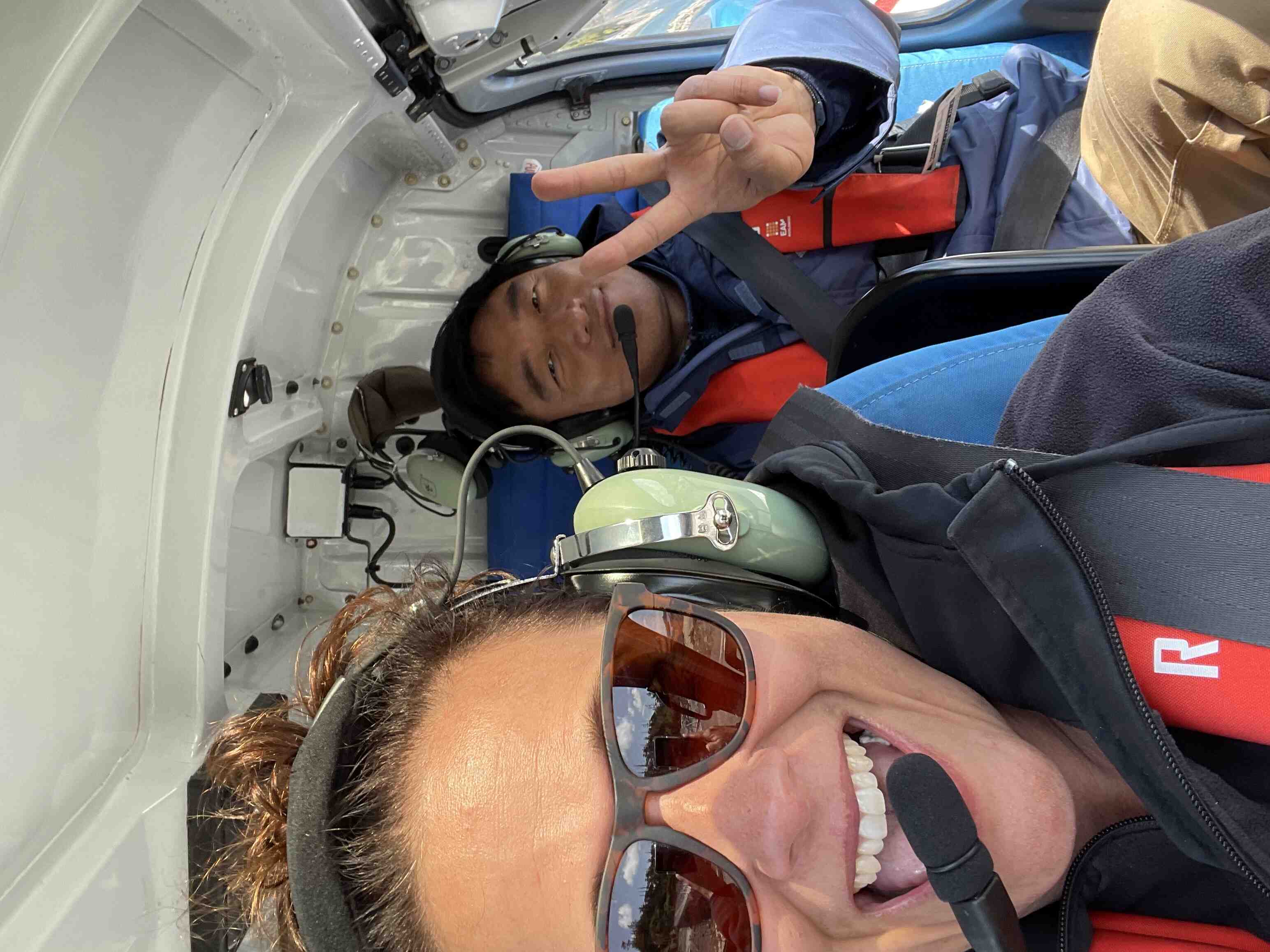 Lisa Nykolaishen and Mingzhou Li in helicopter